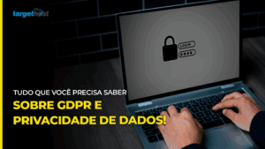 Pessoa mexendo em um computador com um cadeado na tela e o seguinte texto: Tudo que você precisa saber sobre GDPR e privacidade de dados
